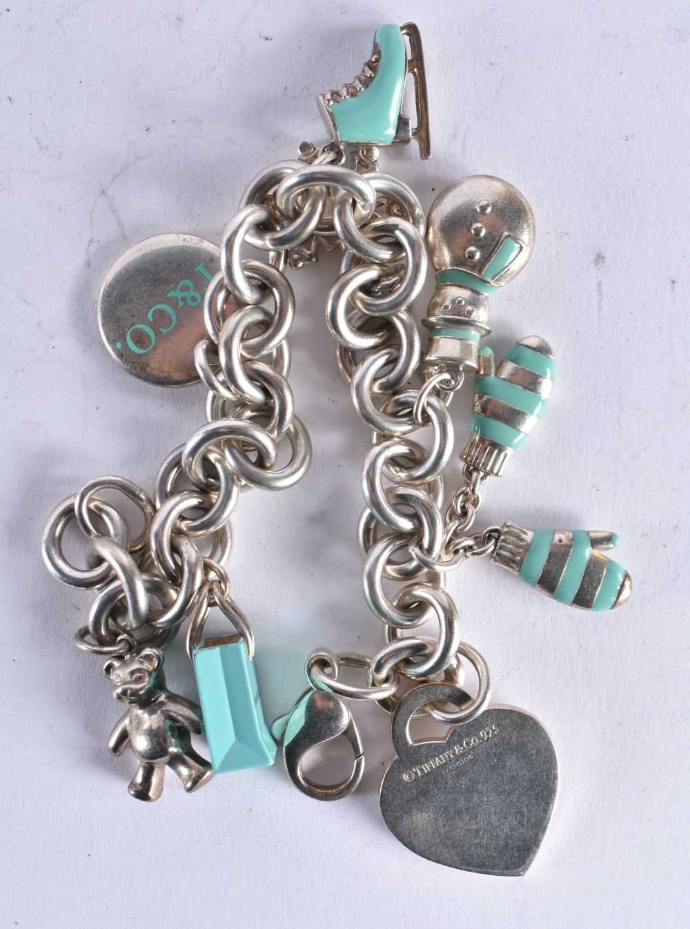 Silver charm bracelet by designer Tiffany & Co. 67 grams. 18.5 cm wide. - Image 5 of 5