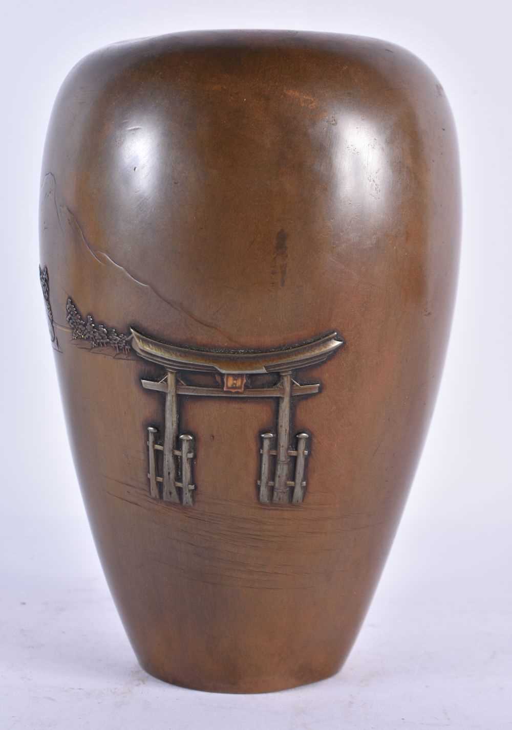 A 19TH CENTURY JAPANESE MEIJI PERIOD BRONZE MIXED METAL VASE decorated with Mt Fuji. 19 cm high.