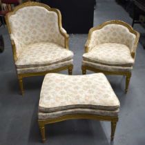 A lovely late 19th century French gilt wood salon suite , upholstered in floral patterns, carved