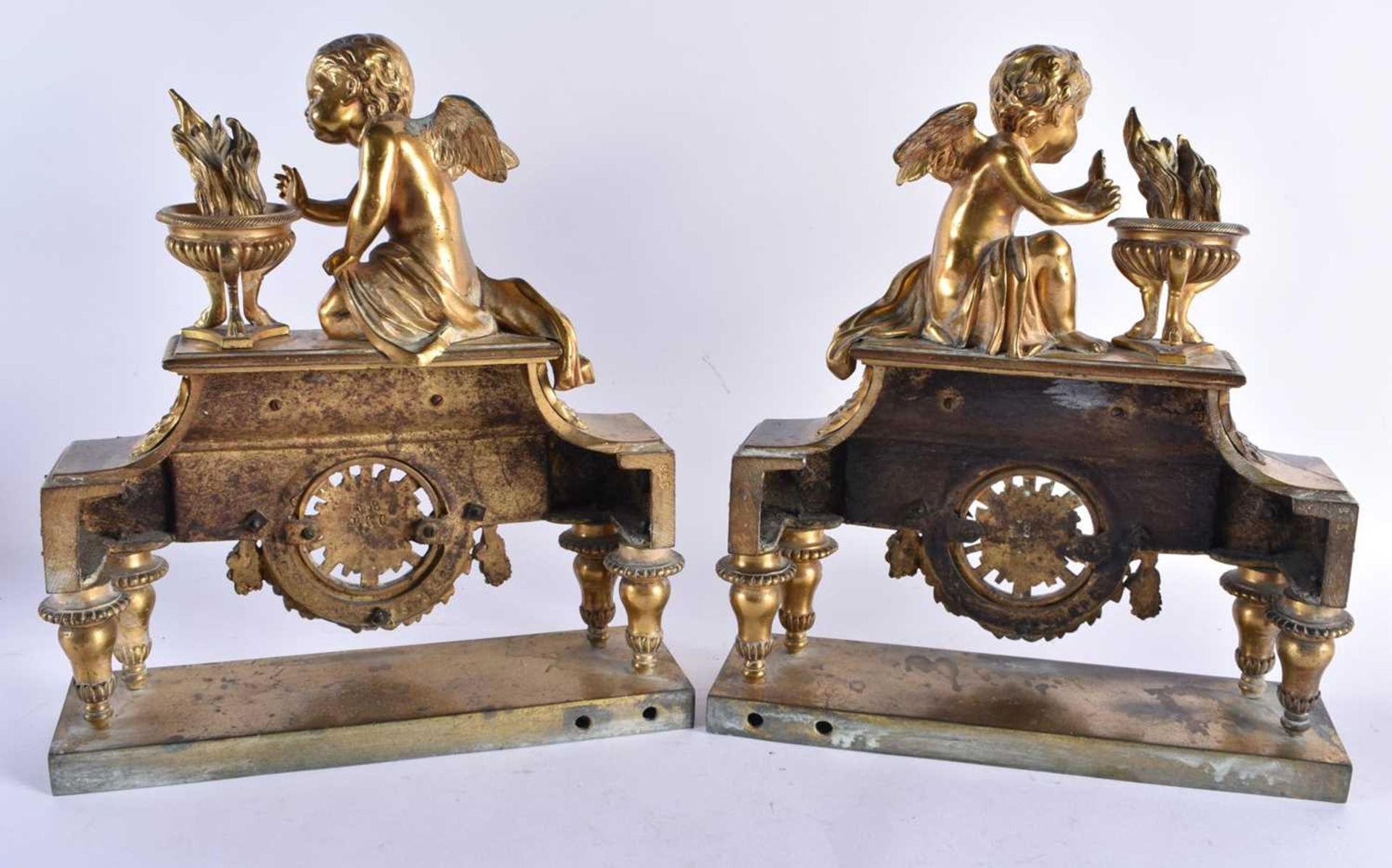A PAIR OF EARLY 19TH CENTURY FRENCH ORMOLU FIRESIDE COMPANIONS formed as putti beside flaming vases, - Image 5 of 6