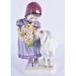 AN UNUSUAL GERMAN MEISSEN PORCELAIN GROUP depicting a child and a young goat. 17 cm high.