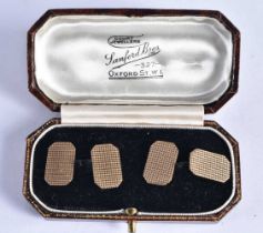 A Pair of 9 Carat Gold Cufflinks in a fitted case with Engine Turned decoration. Stamped 375, 1.