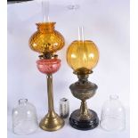 TWO LARGE VICTORIAN/EDWARDIAN COUNTRY HOUSE OIL LAMPS. Largest 67 cm high. (2)