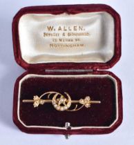 An Antique Victorian 15 Carat Gold and Pearl Moon, Star and Flowers Bar Brooch in original fitted