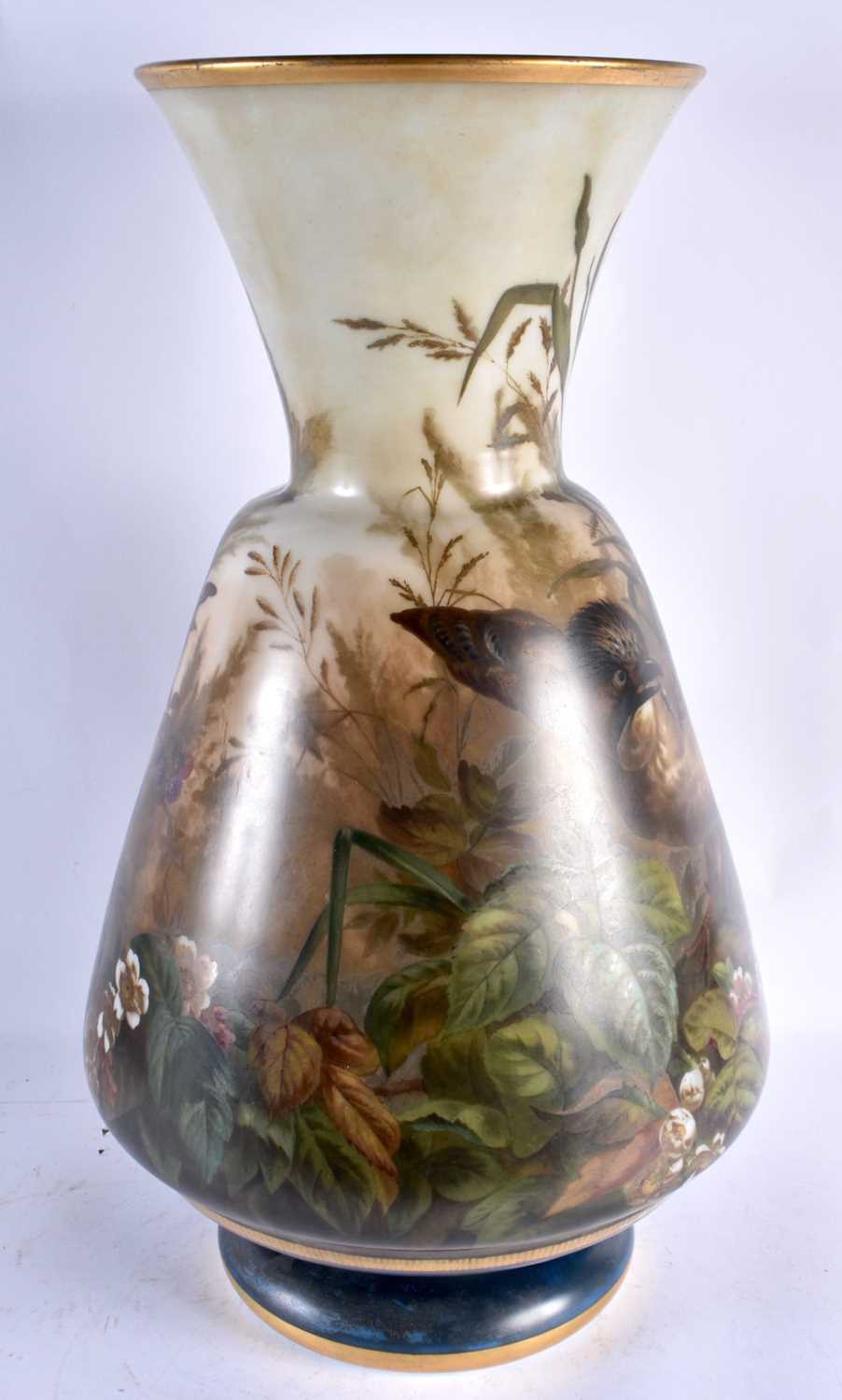 AN UNUSUAL LARGE VICTORIAN OPALINE GLASS VASE painted with birds within landscapes. 53 cm x 25 cm. - Image 7 of 9