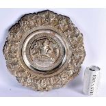 A LARGE 19TH CENTURY INDIAN SILVER REPOUSSE DISH depicting figures on elephants and fighting