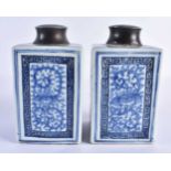 A PAIR OF EARLY 19TH CENTURY CHINESE BLUE AND WHITE PORCELAIN TEA CANISTERS AND COVERS Jiaqing,