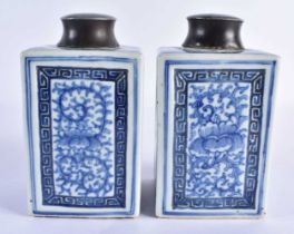 A PAIR OF EARLY 19TH CENTURY CHINESE BLUE AND WHITE PORCELAIN TEA CANISTERS AND COVERS Jiaqing,
