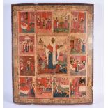 A LARGE 18TH CENTURY RUSSIAN PAINTED AND LACQUERED WOODEN ICON depicting saints in various