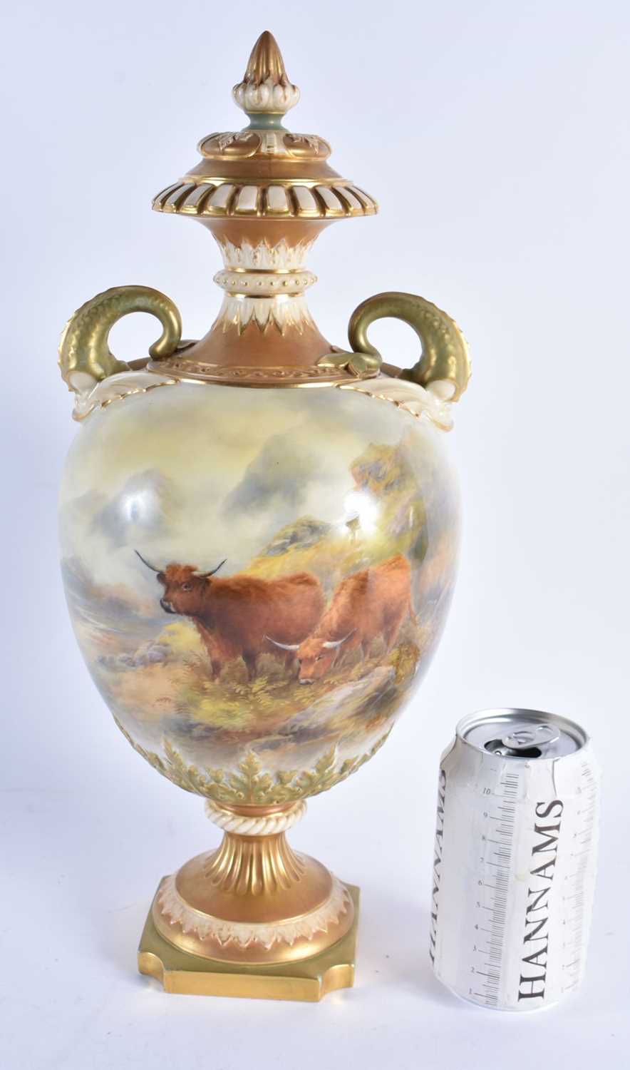 A FINE LARGE ROYAL WORCESTER PORCELAIN TWIN HANDLED VASE AND COVER by John Stinton, painted with two
