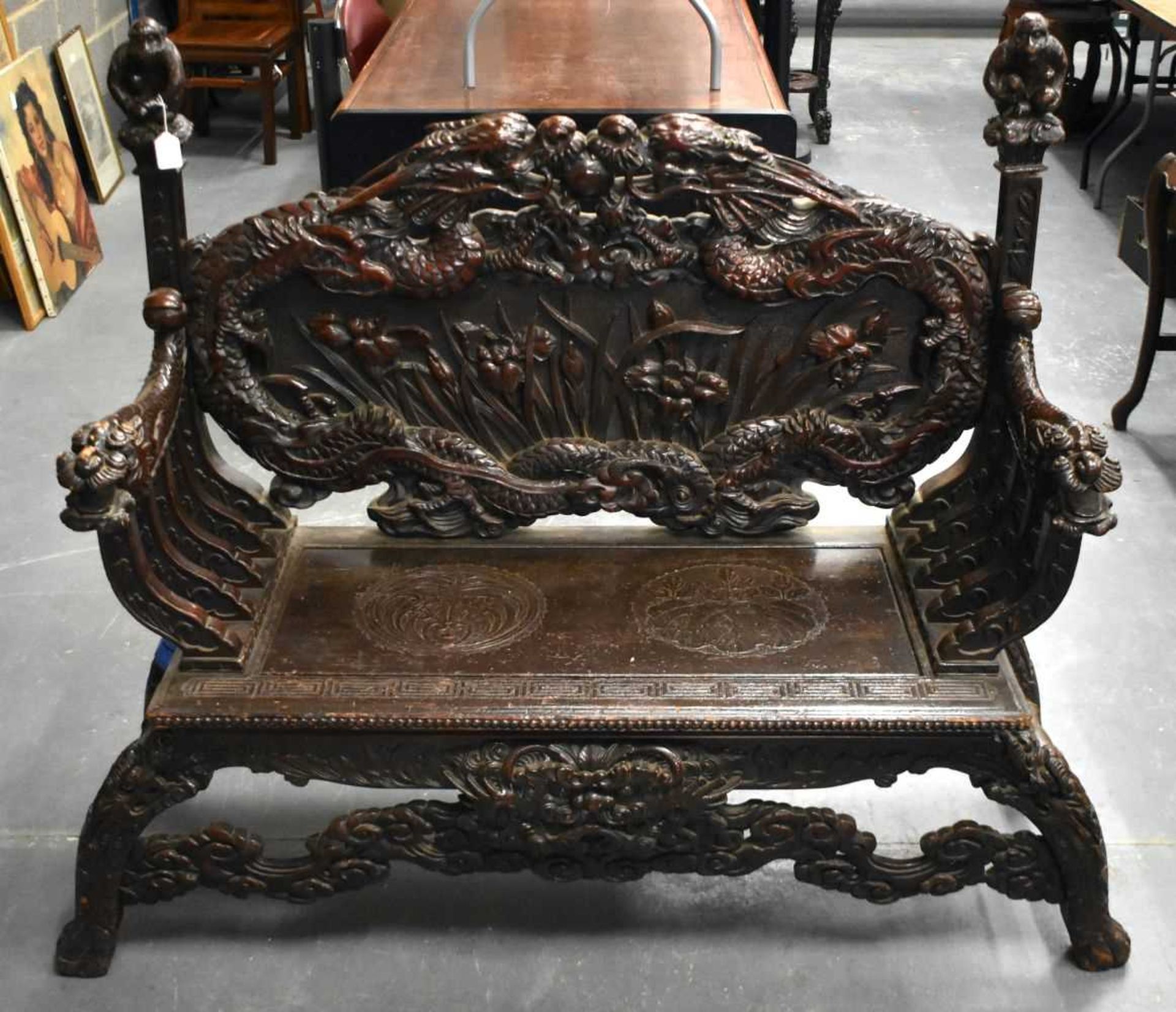 A LARGE 19TH CENTURY JAPANESE MEIJI PERIOD CARVED WOOD DRAGON BENCH. 125 cm x 125 cm.