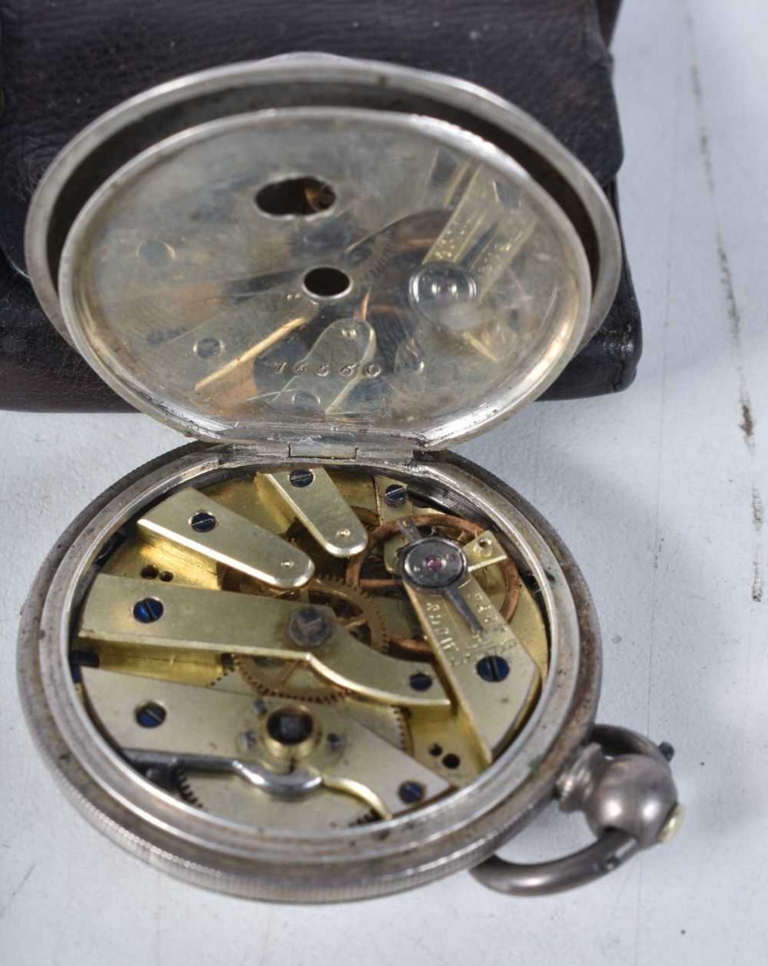 A Miniature Silver Half Hunter Pocket Watch with Black Enamel Numerals on Case in a Leather Pouch. - Image 3 of 3