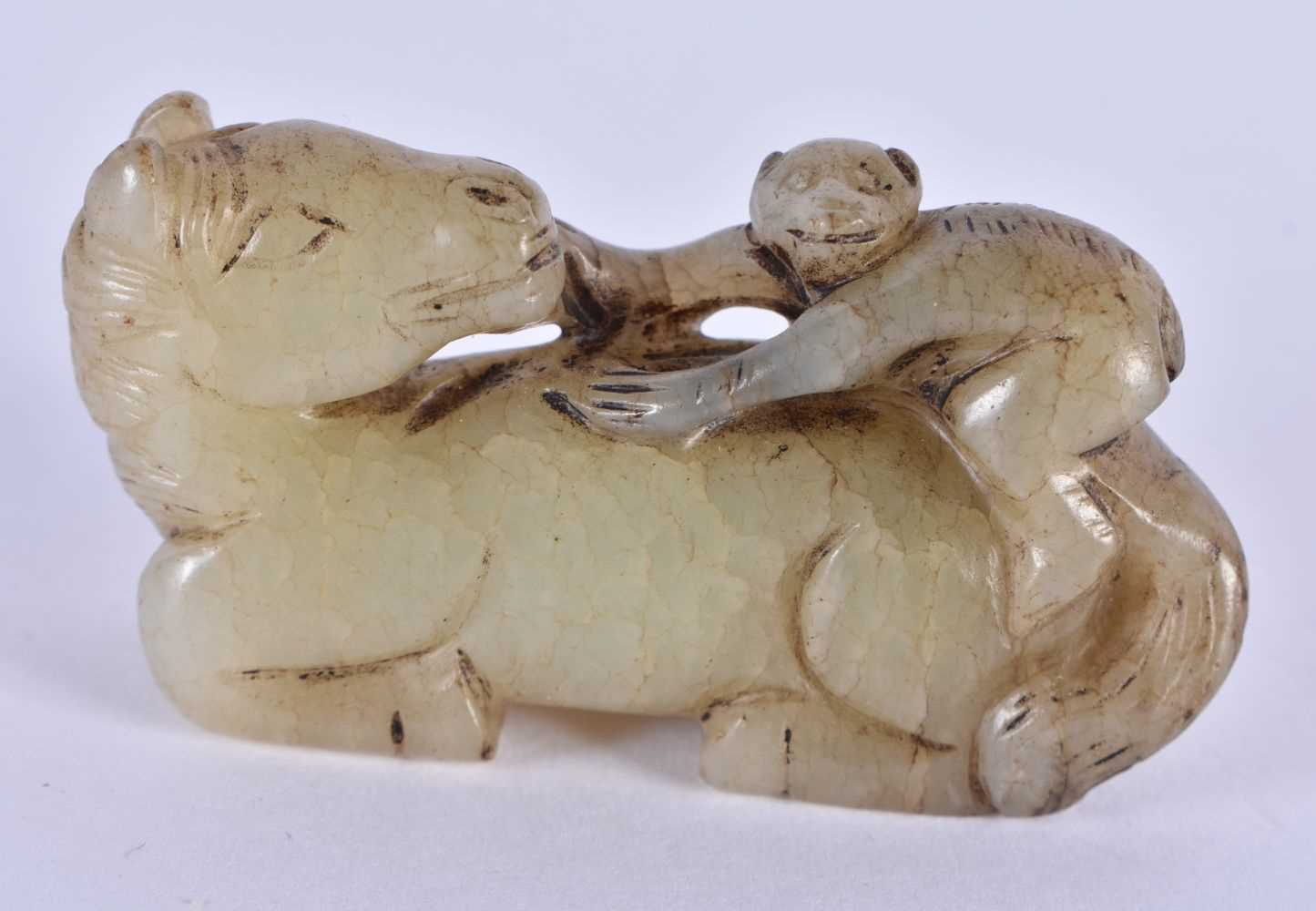 A 19TH CENTURY CHINESE CARVED GREEN JADE FIGURE OF A MONKEY AND HORSE Qing. 5.75 cm x 3 cm.