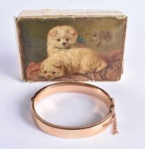 A Plain 9 Carat Gold Bangle with inscription1905. Stamped 375, 5.8cm x 5cm internal, weight 8.7g.