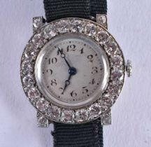 AN ART DECO WHITE GOLD AND DIAMOND COCKTAIL WATCH. 14.4 grams overall. 2.5 cm wide inc crown.