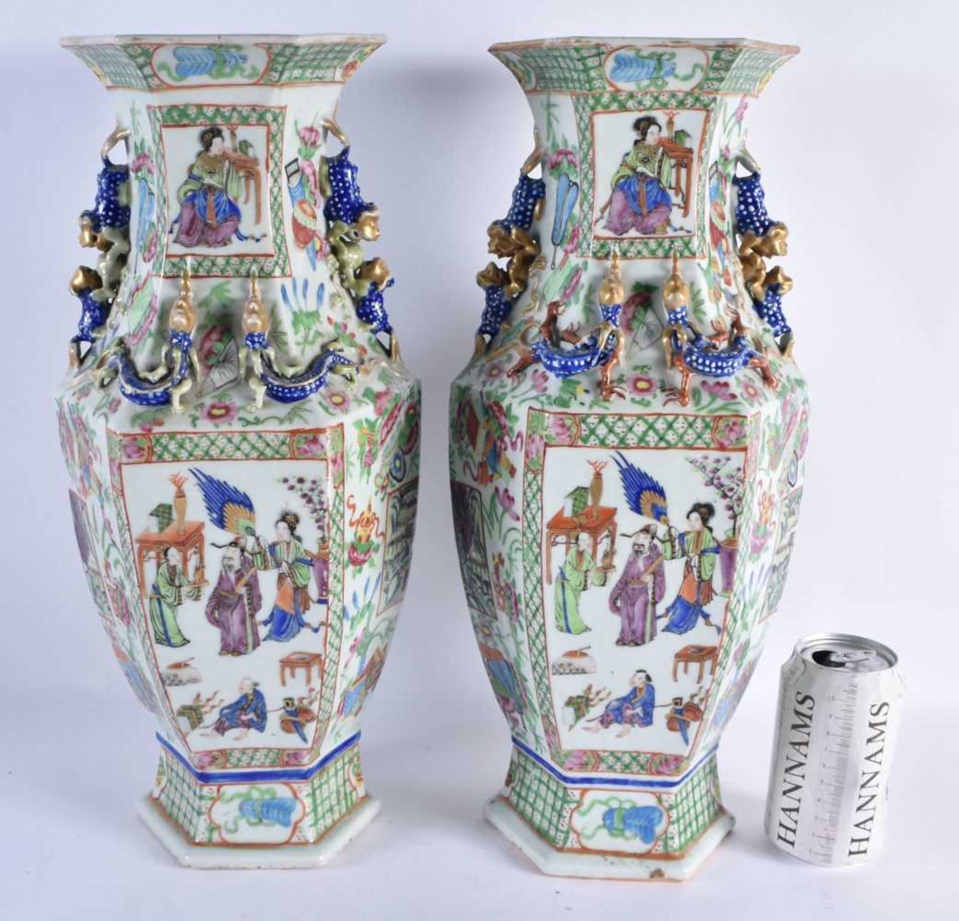 A LARGE PAIR OF 19TH CENTURY CHINESE CANTON FAMILLE ROSE VASES Qing, painted with immortals within