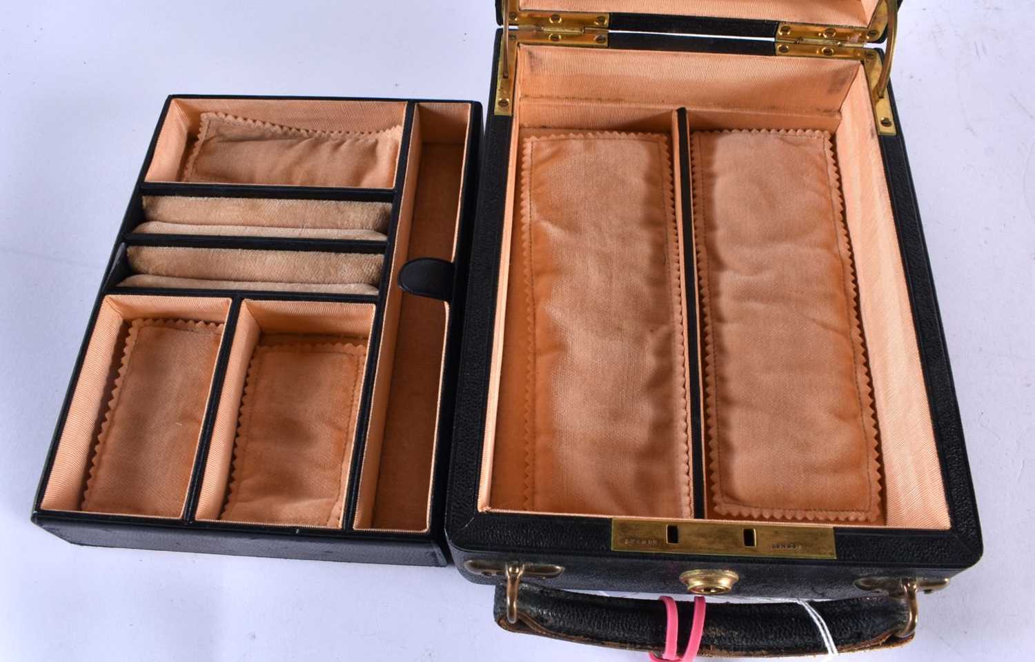 A Leather Travelling Jewellery Box with a Bramah Lock and Key and fitted interior. 20.5cm x 15cm x - Image 2 of 5