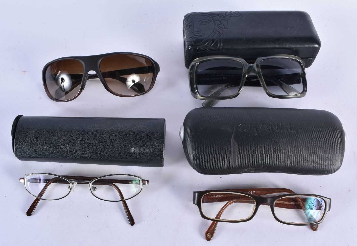 FOUR PAIRS OF RAYBAN SUNGLASSES. 15 cm wide. (4)