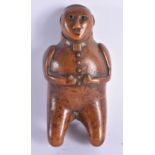 A SMALLER 18TH CENTURY CARVED TREEN WOOD SNUFF BOX formed as a portly male, modelled with hands upon