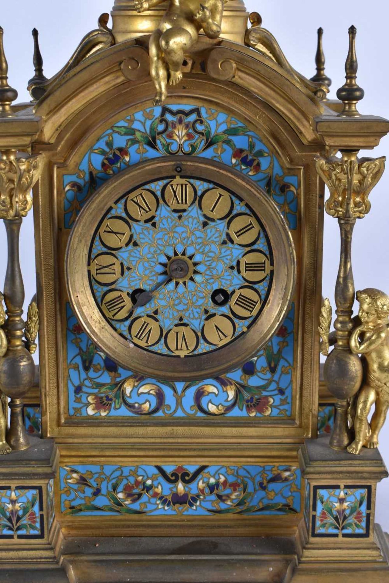 A FINE 19TH CENTURY FRENCH ORMOLU AND CHAMPLEVE ENAMEL CLOCK GARNITURE formed with putti amongst - Image 3 of 9