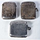 Three Engraved Silver Vesta Cases. Hallmarks include Birmingham 1921. Largest 5.3cm x 4cm x 1.2cm,