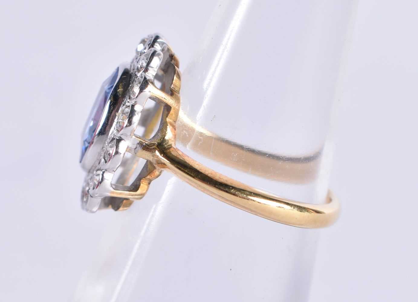 AN EDWARDIAN 18CT GOLD DIAMOND AND PALE SAPPHIRE RING. K. 4.6 grams. - Image 2 of 8