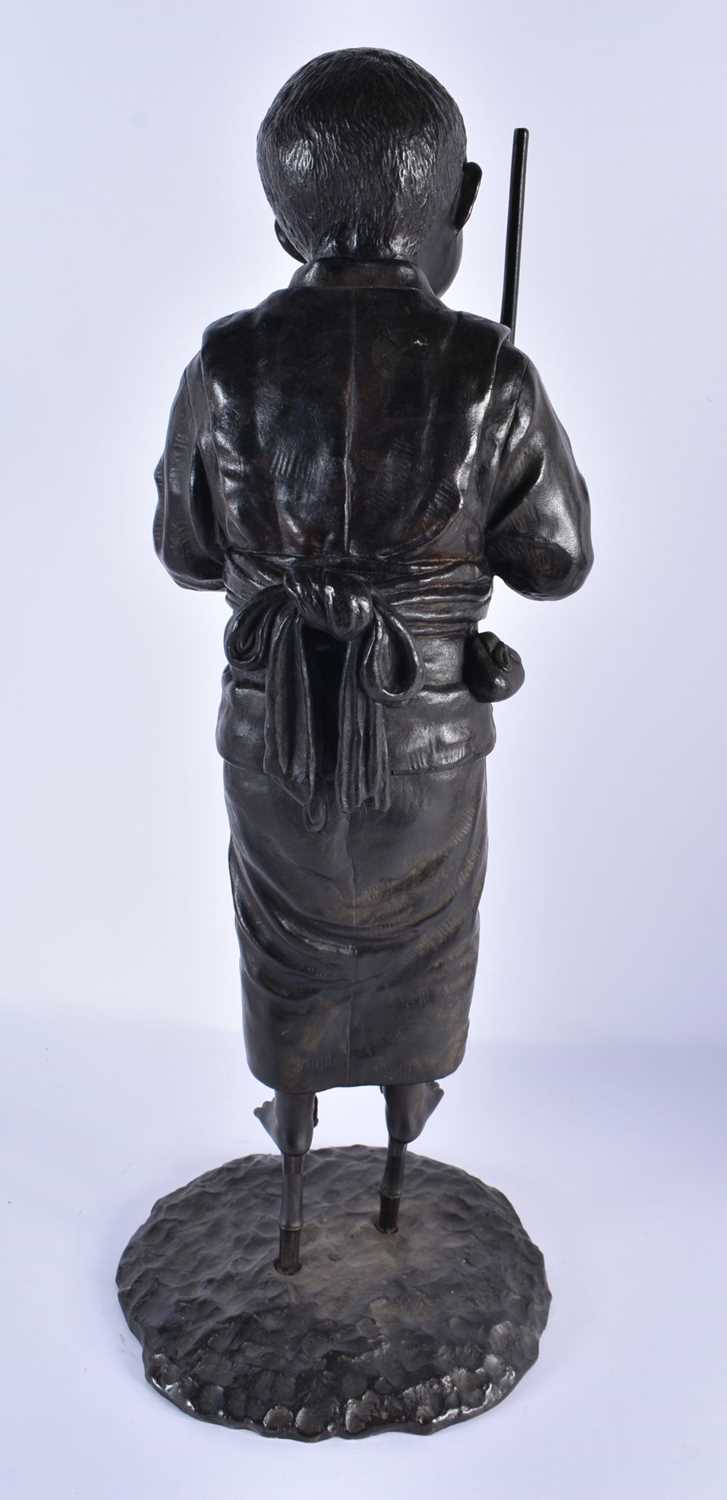 A LARGE 19TH CENTURY JAPANESE MEIJI PERIOD BRONZE OKIMONO modelled as a young boy walking on stilts. - Image 4 of 6