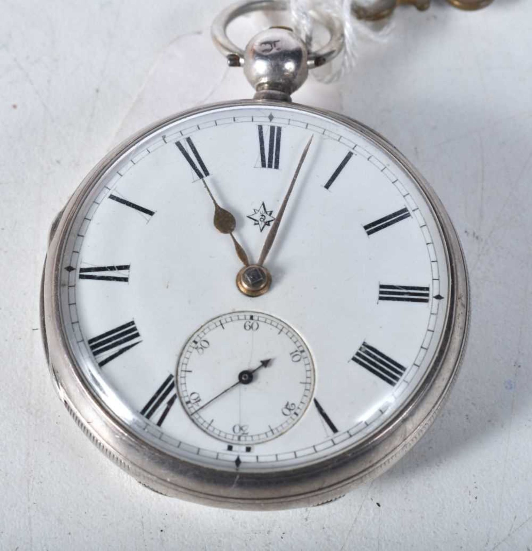 A Victorian Silver Pocket Watch. Hallmarked London 1884. 4.6cm diameter, weight 94g. Runs then