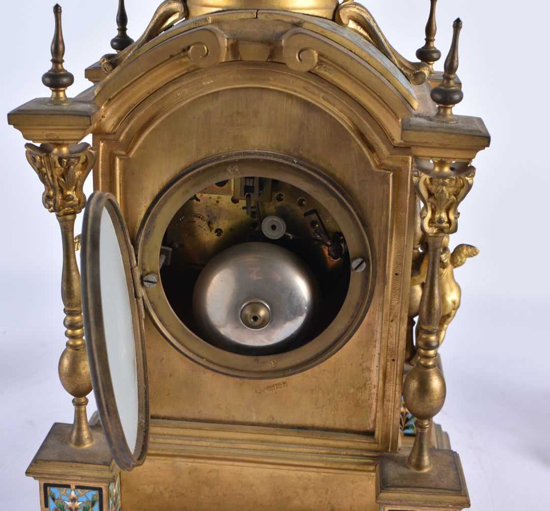 A FINE 19TH CENTURY FRENCH ORMOLU AND CHAMPLEVE ENAMEL CLOCK GARNITURE formed with putti amongst - Image 9 of 9
