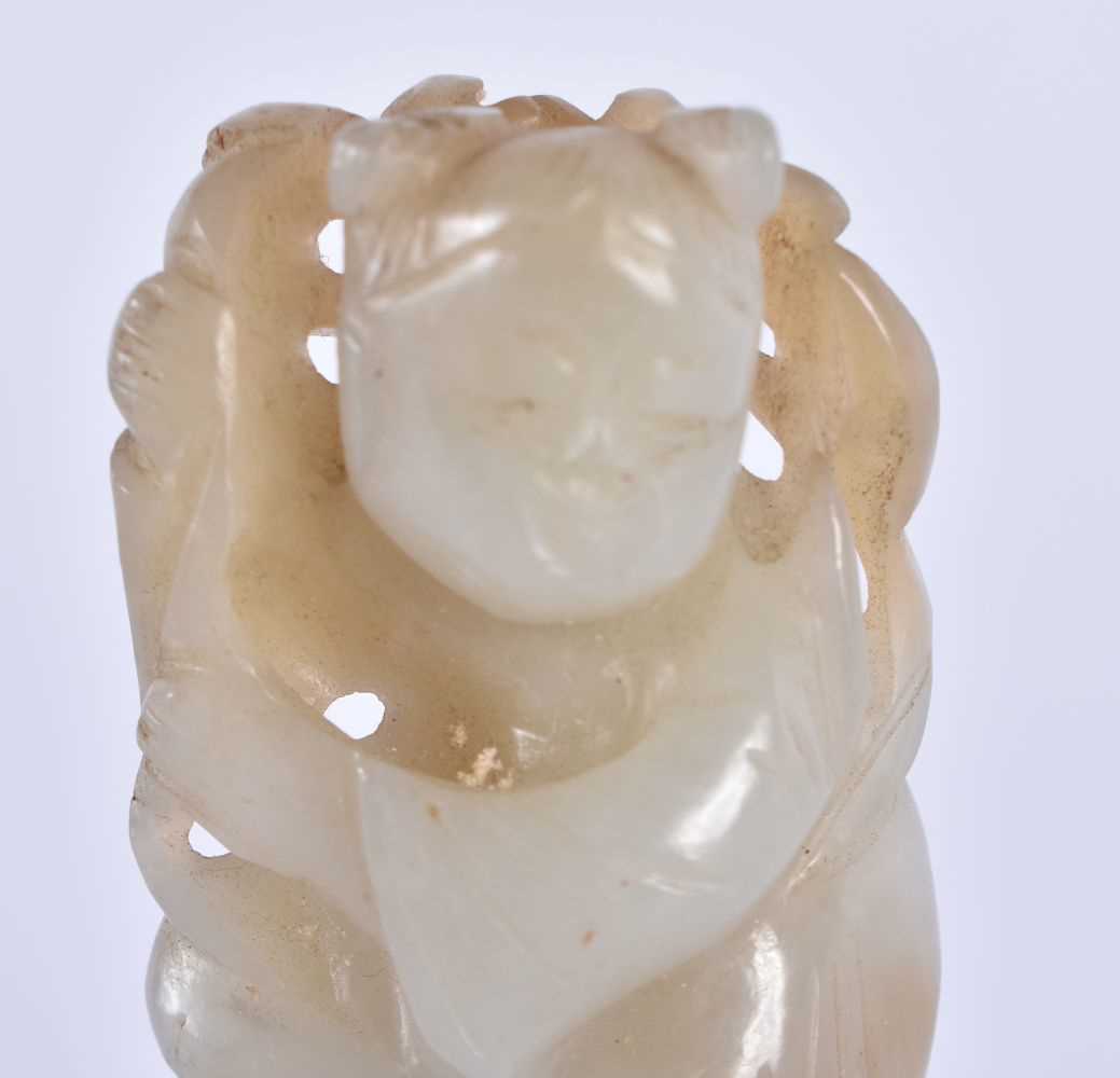 A 19TH CENTURY CHINESE CARVED JADE FIGURE OF A YOUNG CHILD Qing, modelled holding foliage. 7.5 cm - Image 2 of 7