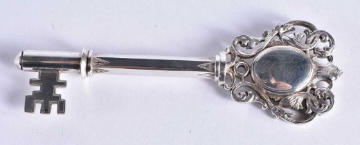 A Silver Ceremonial Key with a hidden compartment in the Bow by Vaughton & Sons. Hallmarked
