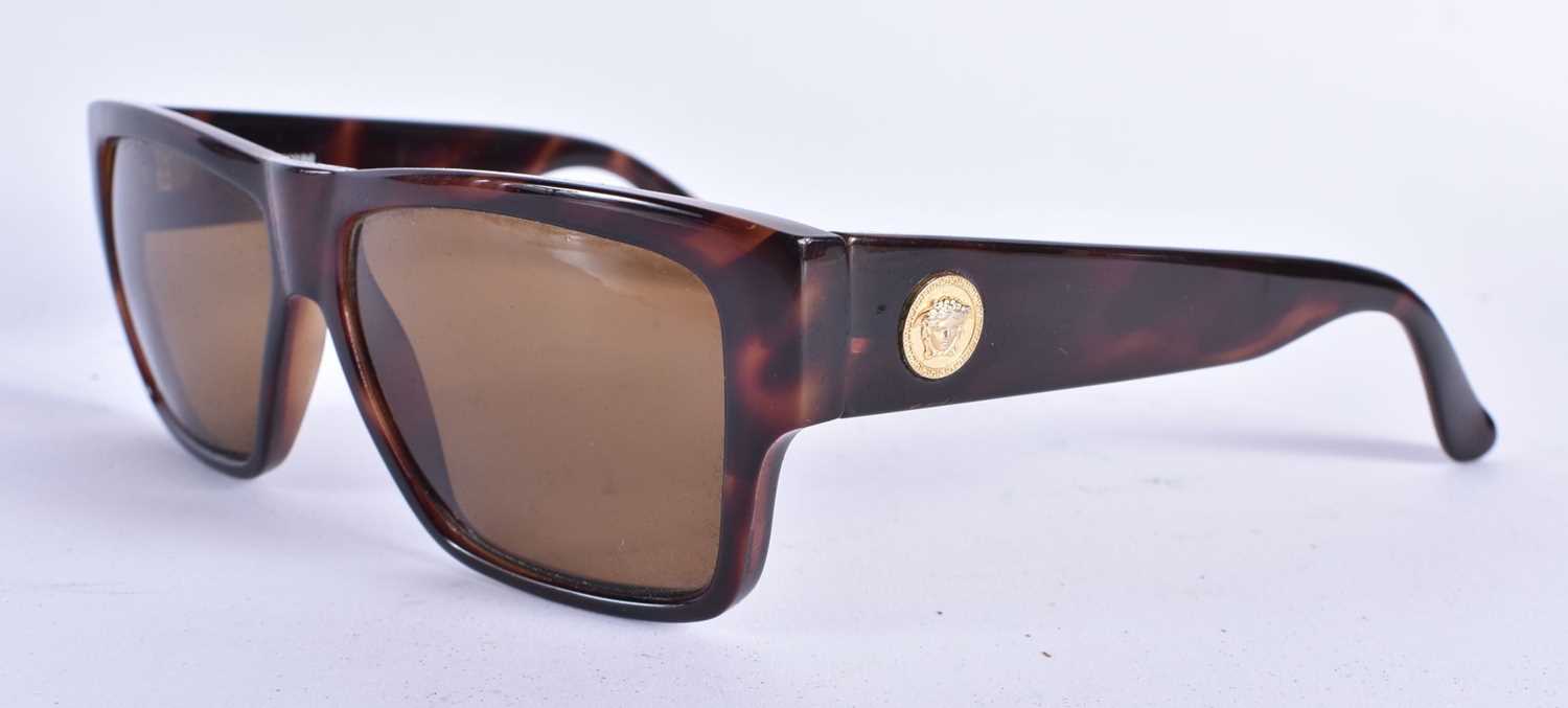 A PAIR OF VERSACE SUNGLASSES. 15 cm wide.