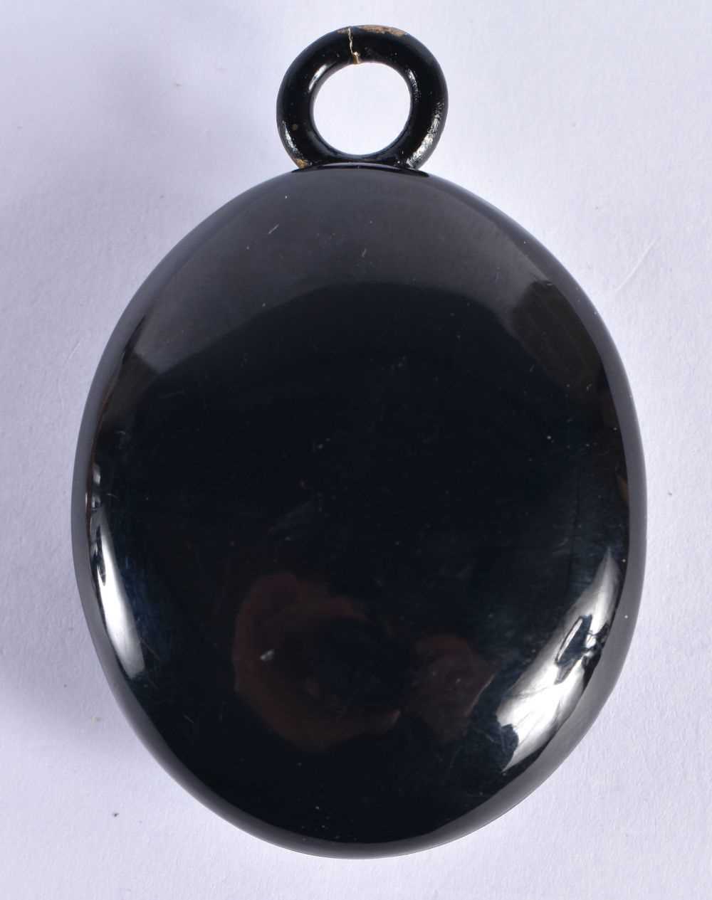 A Victorian Jet Mourning Locket set with a Gold Cross mounted with Pearls. 5.5cm x 3.7cm x 1.7cm, - Image 3 of 3