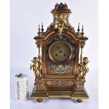 A LARGE 19TH CENTURY FRENCH CHAMPLEVE ENAMEL BRONZE MANTEL CLOCK formed with numerous putti and an
