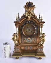 A LARGE 19TH CENTURY FRENCH CHAMPLEVE ENAMEL BRONZE MANTEL CLOCK formed with numerous putti and an