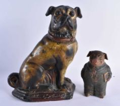 A LARGE ANTIQUE CONTINENTAL POTTERY DOG together with an Austrian terracotta pig tobacco jar and