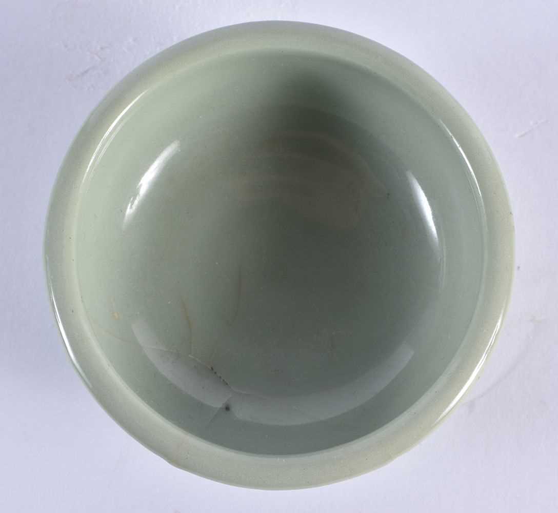 A CHINESE MING DYNASTY CELADON CIRCULAR DISH together with a Qing dynasty guan type bowl. Largest 14 - Image 6 of 7