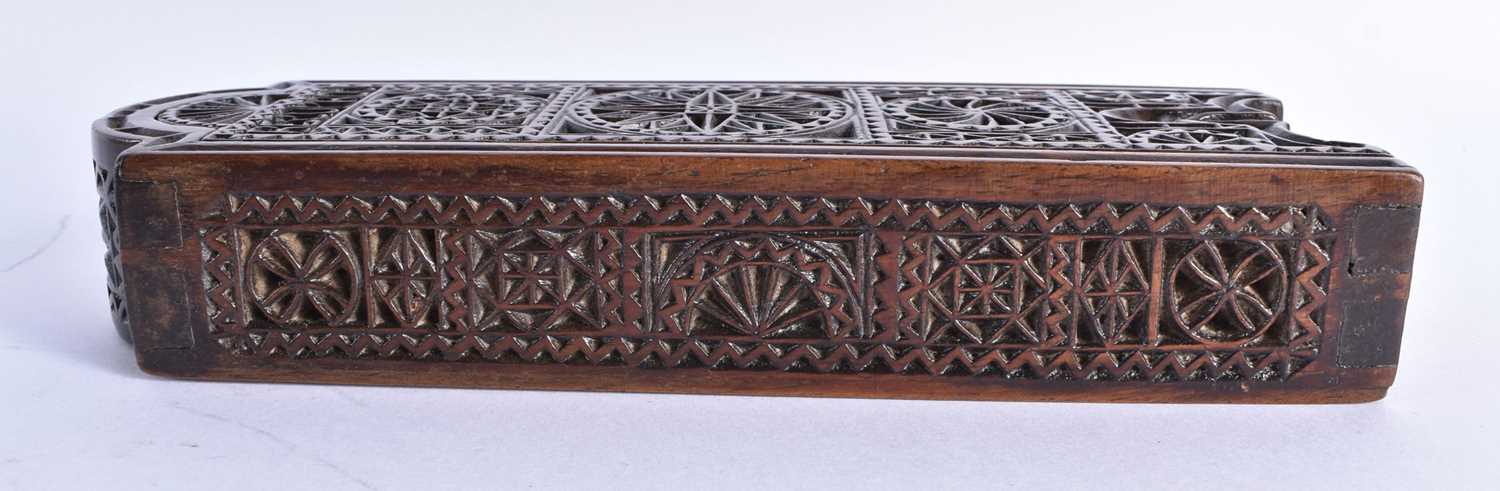 AN UNUSUAL CASED PAIR OF EARLY 19TH CENTURY TREEN NUT CRACKERS decorated with sunburst motifs, the - Image 7 of 8