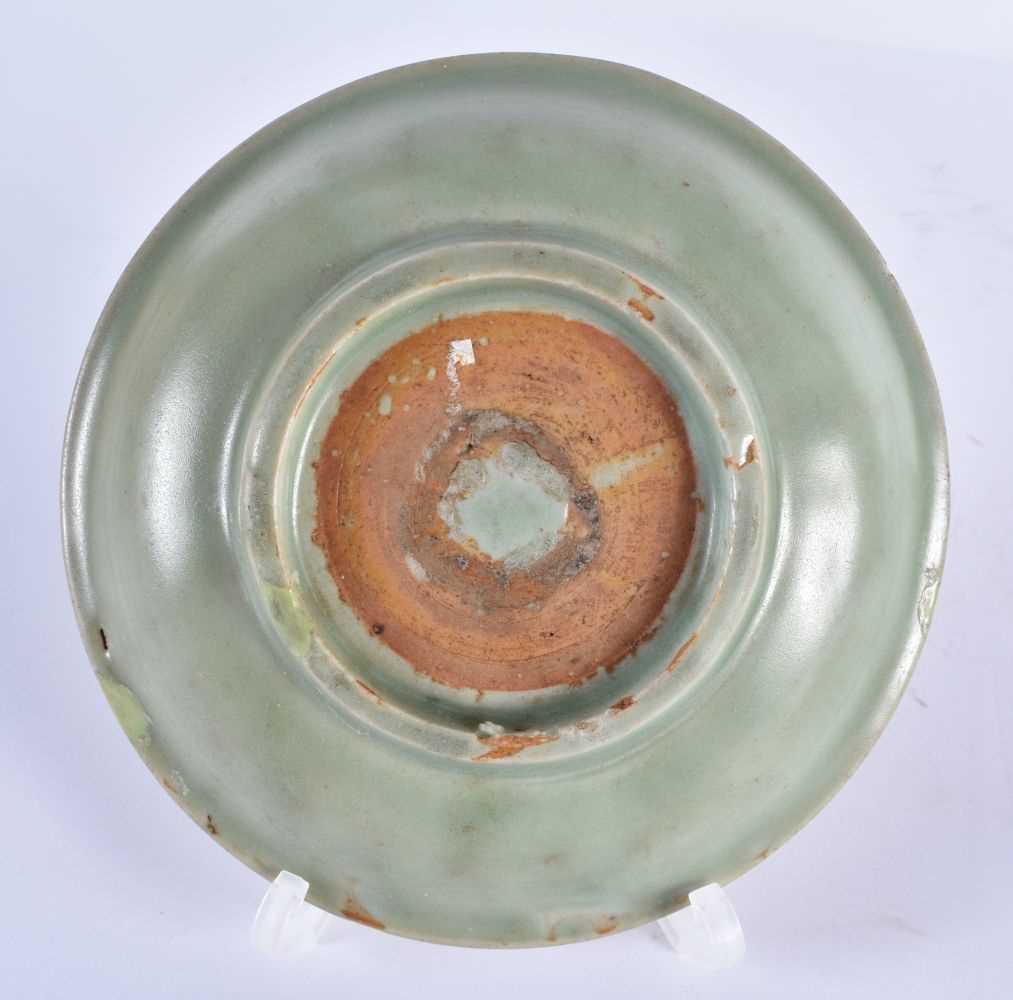 A CHINESE MING DYNASTY CELADON CIRCULAR DISH together with a Qing dynasty guan type bowl. Largest 14 - Image 3 of 7