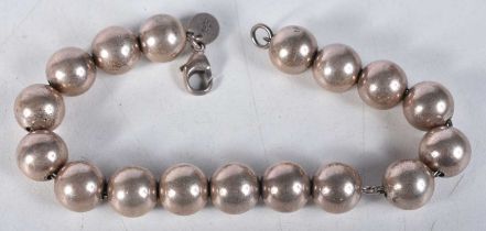 Silver beaded bracelet by designer Tiffany & Co. Stamped Tiffany 925. 18cm long, weight 18g, Bead