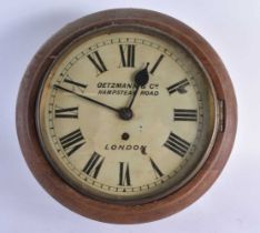 AN ANTIQUE OETZMANN & CO HAMPSTEAD ROAD LONDON WALL CLOCK. 33 cm wide.