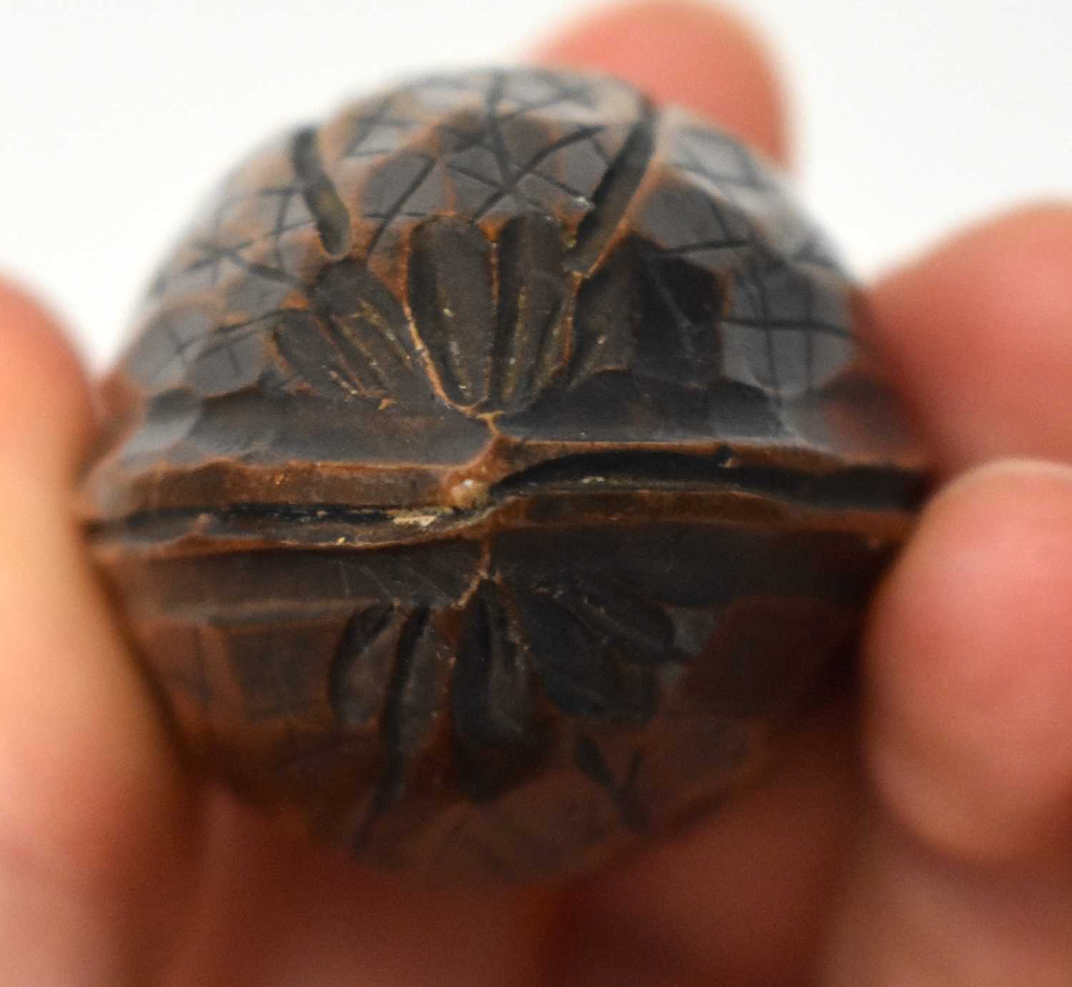 AN EXTREMELY RARE ANTIQUE CARVED NUT GLOBE the body rotating to reveal a tiny pocket globe. Nut 6 cm - Image 20 of 20