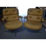 A STYLISH PAIR OF HERMAN MILLER LEATHER SWIVEL CHAIRS. 78 cm x 62 cm.