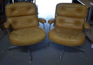 A STYLISH PAIR OF HERMAN MILLER LEATHER SWIVEL CHAIRS. 78 cm x 62 cm.