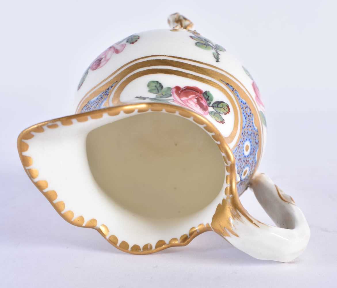 AN 18TH CENTURY FRENCH SEVRES PORCELAIN CREAM JUG painted with flowers. 9 cm x 8 cm. - Image 5 of 6