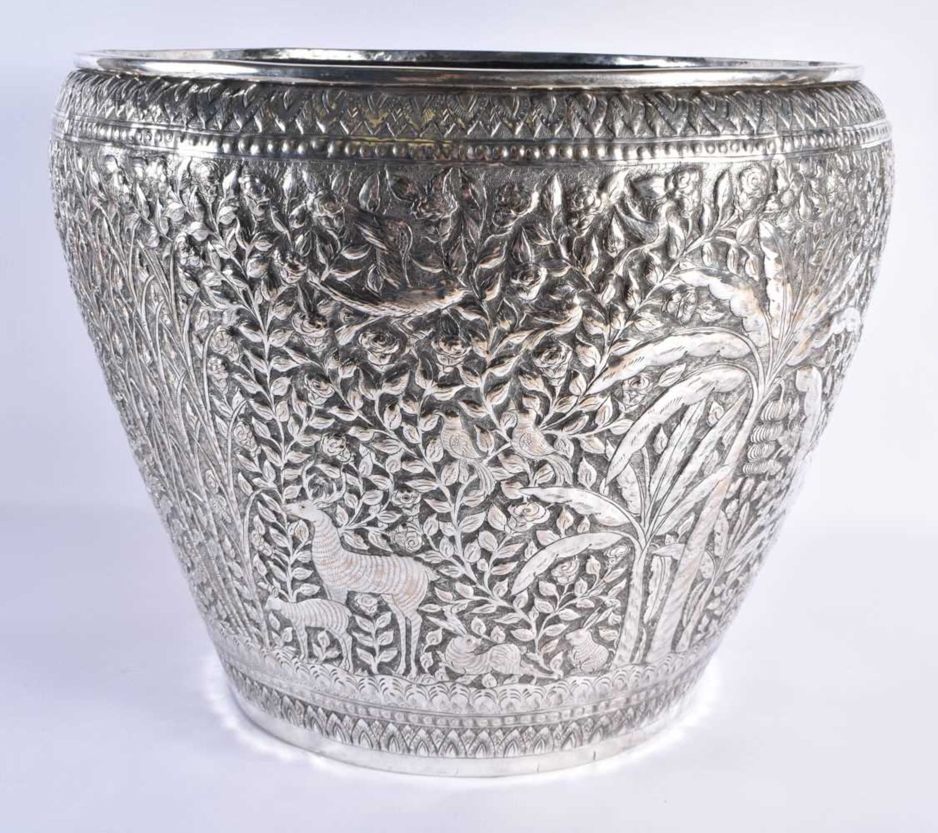 A VERY LARGE LATE 19TH CENTURY INDIAN WHITE METAL JARDINIERE decorative with animals and palm trees, - Image 2 of 5