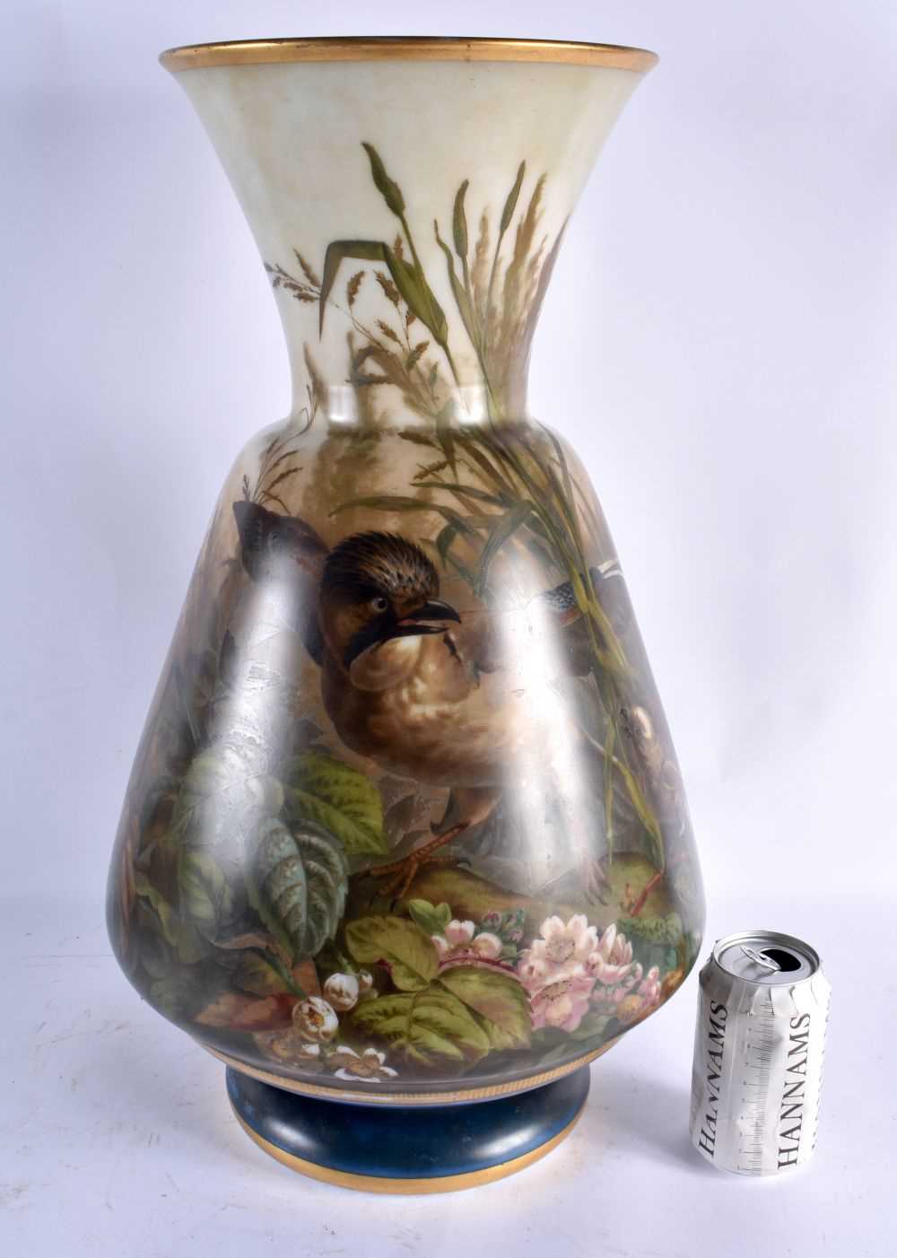 AN UNUSUAL LARGE VICTORIAN OPALINE GLASS VASE painted with birds within landscapes. 53 cm x 25 cm.