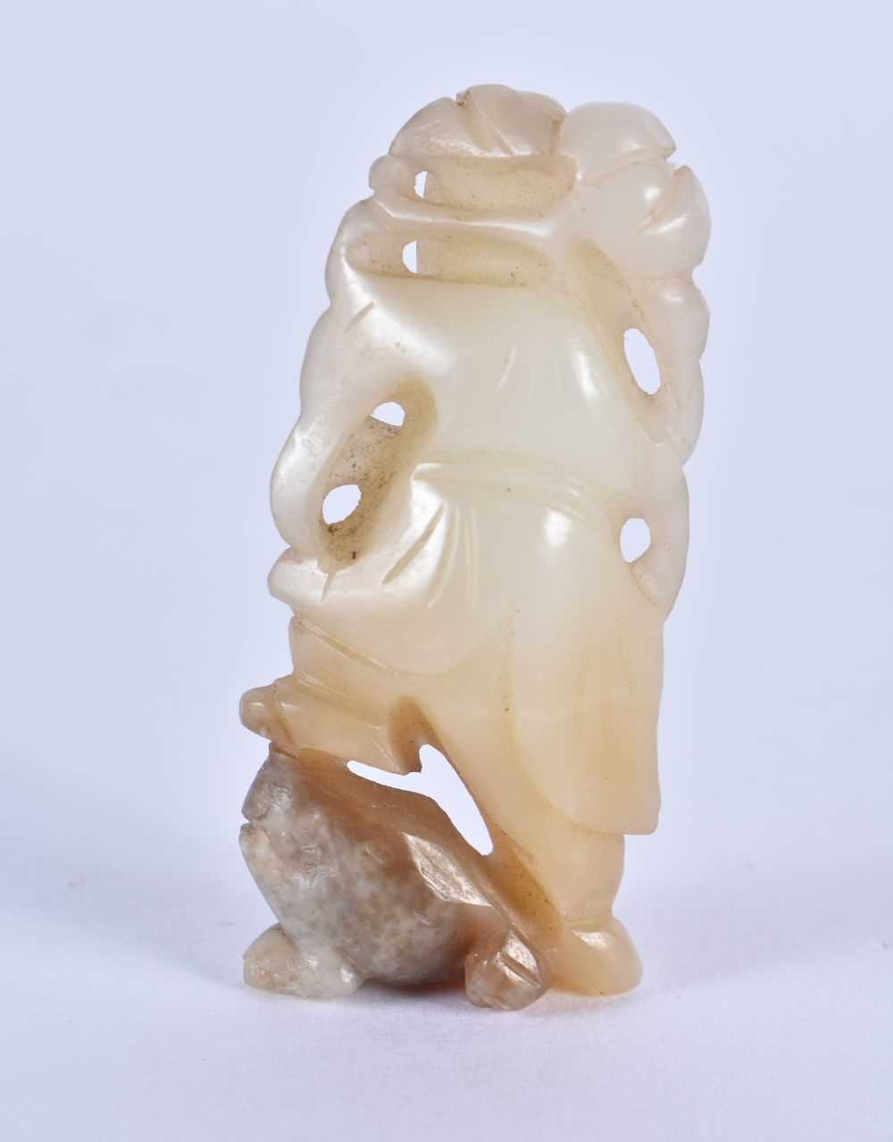 A 19TH CENTURY CHINESE CARVED JADE FIGURE OF A BOY Qing, modelled standing upon a toad. 5 cm x 2.5 - Image 2 of 4