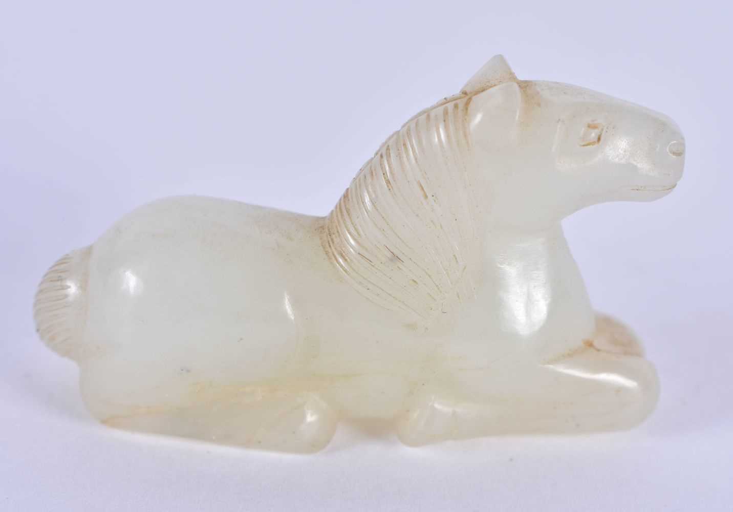 A 19TH CENTURY CHINESE CARVED WHITE JADE FIGURE OF A RECUMBANT HORSE Qing. 3 cm x 2 cm. - Image 2 of 12