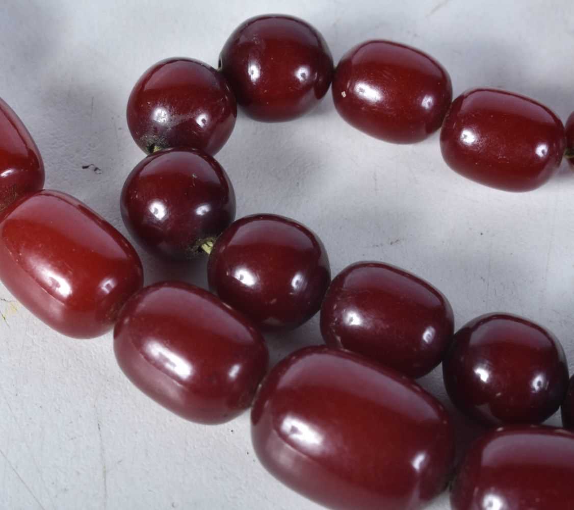 Cherry Bakelite graduated necklace. 83cm long, weight 90g, largest bead 15mm - Image 2 of 6